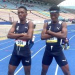 Jamaica College students celebrating victory at Champs