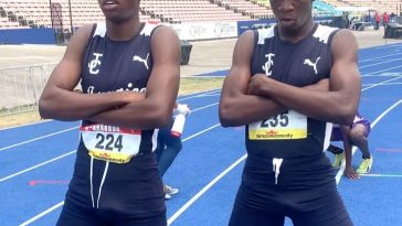 Jamaica College students celebrating victory at Champs