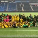 The Reggae Girlz celebrate after clinching a spot in the 2023 Women's World Cup