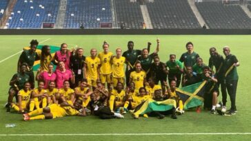 The Reggae Girlz celebrate after clinching a spot in the 2023 Women's World Cup