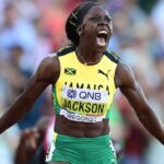 Shericka Jackson celebrates after winning the women's 200m at the 2022 IAAF World Championships