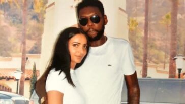 Vybz Kartel spends time with his fiancee, Sidem Ozturk, during an authorized prison visit earlier this year.