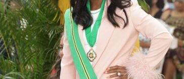 Shelly-Ann Fraser-Pryce shows her Order of Jamaica medal at the 2022 National Awards