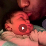 Konshens kisses his newborn son, Zayn Spence. Zayn is Konshens' second son with his wife, Latoya Spence