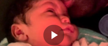 Konshens kisses his newborn son, Zayn Spence. Zayn is Konshens' second son with his wife, Latoya Spence