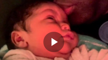 Konshens kisses his newborn son, Zayn Spence. Zayn is Konshens' second son with his wife, Latoya Spence