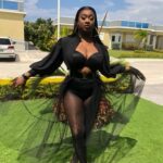 Shaneil Muir in all-black during a photoshoot
