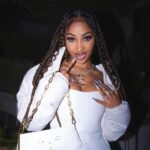 Shenseea posing at Diddy's 53rd birthday party in Los Angeles