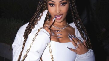 Shenseea posing at Diddy's 53rd birthday party in Los Angeles