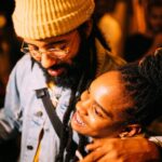 Grammy nominees Protoje and Koffee hang out at a party.