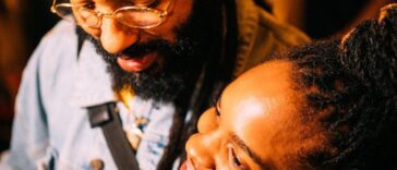 Grammy nominees Protoje and Koffee hang out at a party.