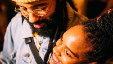 Grammy nominees Protoje and Koffee hang out at a party.