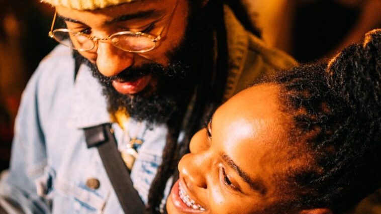 Grammy nominees Protoje and Koffee hang out at a party.