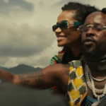 Popcaan and Toni-Ann Singh ride a motorcycle in their music video for 'Next to Me'