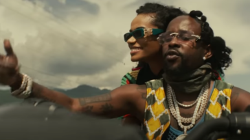 Popcaan and Toni-Ann Singh ride a motorcycle in their music video for 'Next to Me'