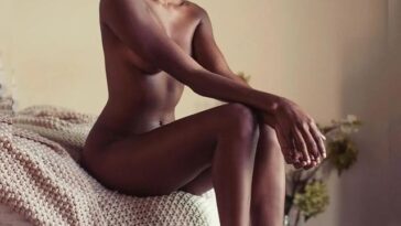 Davina Bennett poses on a bed for a Valentine's Day photoshoot