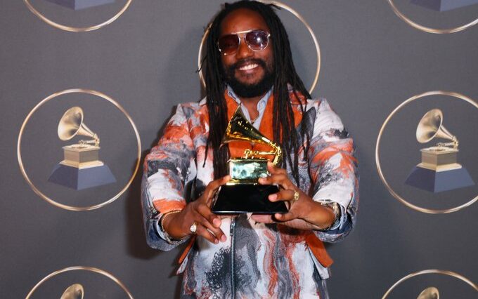 Kabaka Pyramid holds his Reggae Grammy award on the red carper at the 65th Grammy Awards in Los Angeles.