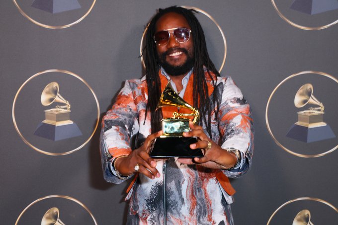 Kabaka Pyramid holds his Reggae Grammy award on the red carper at the 65th Grammy Awards in Los Angeles.