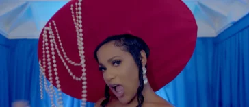 Ishawna sings in a church during music video for New Child