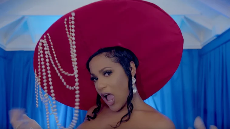 Ishawna sings in a church during music video for New Child