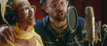 Shaggy and Marcia Griffiths sing their remixed version of Electric Boogie