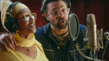 Shaggy and Marcia Griffiths sing their remixed version of Electric Boogie