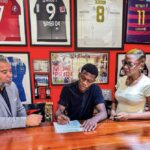 Dujuan Richards signs his pre-contract agreement to join Chelsea FC alongside his mother and Craig Butler