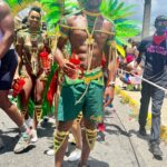 Asafa Powell and Alyshia Miller-Powell at the 2023 Jamaica Carnival Road March in Kingston.