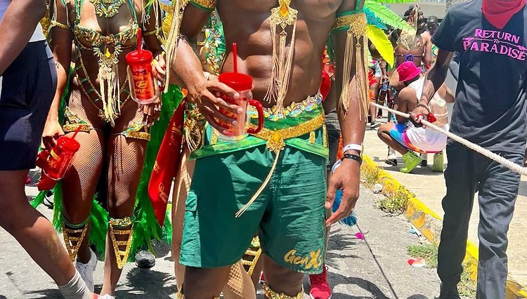 Asafa Powell and Alyshia Miller-Powell at the 2023 Jamaica Carnival Road March in Kingston.