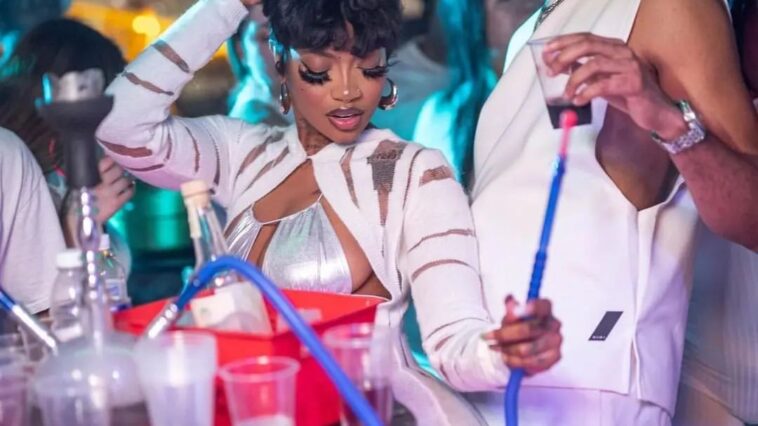 Cham and Jada Kingdom dance with each other during the music video for Slow Motion