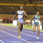 Shericka Jackson crosses the line in the women's 100m final at the 2023 Racers Grand Prix