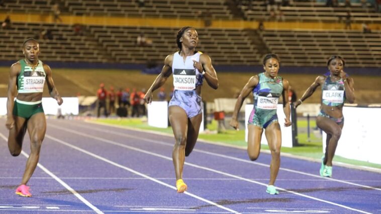 Shericka Jackson crosses the line in the women's 100m final at the 2023 Racers Grand Prix