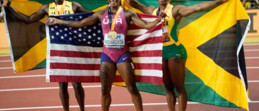 Sha'Carri Richardson, Shelly-Ann Fraser-Pryce and Shericka Jackson celebrate after the 100m final at the 2023 IAAF World Championships in Athletics