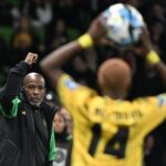 Reggae Girlz coach Lorne Donaldson gestures to his players during a 2023 Women's World Cup game