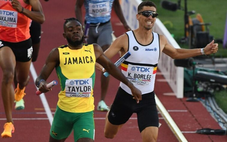 Christopher Taylor crosses the finish line in the men's 4x400 m relay final at the 2022 IAAF World Championships