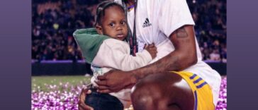 Konya Plummer celebrates the Liga MX Feminil title with Tigres alongside her son.