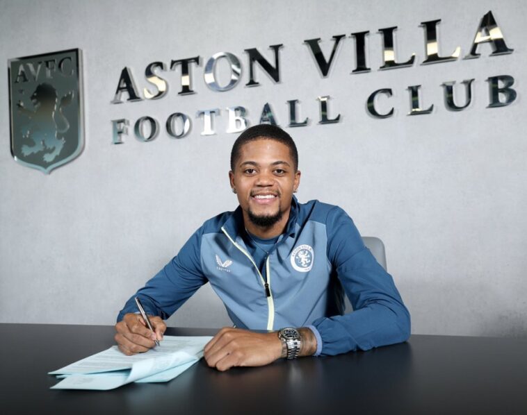 Leon Bailey signs his new contract for Aston Villa.