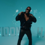 Aidonia performs in his music video for "Moonwalk."