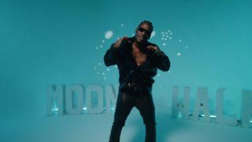 Aidonia performs in his music video for "Moonwalk."