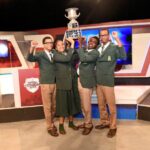 St. Jago's School's Challenge Quiz team raises the trophy after winning the 2024 final vs. Calabar High School