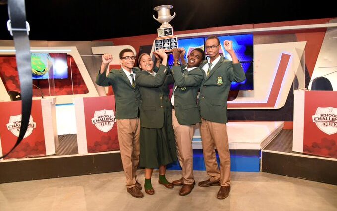 St. Jago's School's Challenge Quiz team raises the trophy after winning the 2024 final vs. Calabar High School