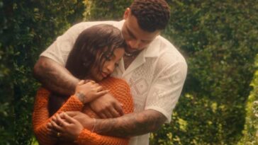 Shenseea embraces her male lead in the music video for "Neva Neva."