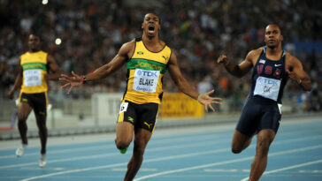 Yohan Blake celebrates after winning the world men's 100m title at Daegu 2011.