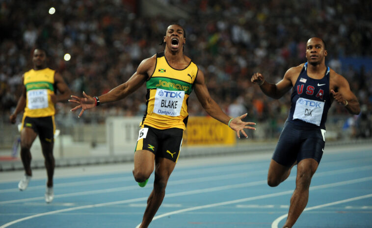 Yohan Blake celebrates after winning the world men's 100m title at Daegu 2011.