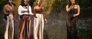 Shenseea performs with her backup singers on The Tonight Show Starring Jimmy Fallon.