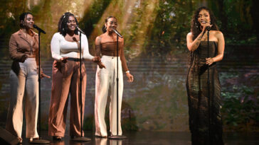 Shenseea performs with her backup singers on The Tonight Show Starring Jimmy Fallon.