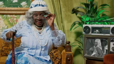 Spice looks onward during the music video for '2085 Tea.'