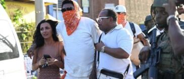 Vybz Kartel walks out of prison with his fiancee, Sidem Ozturk.