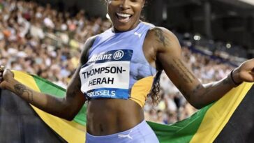 Elaine Thompson Herah celebrating after winning a meet in Brussels, Belgium.