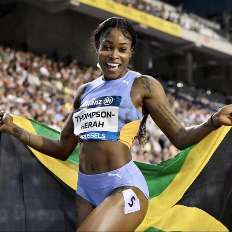 Elaine Thompson Herah celebrating after winning a meet in Brussels, Belgium.